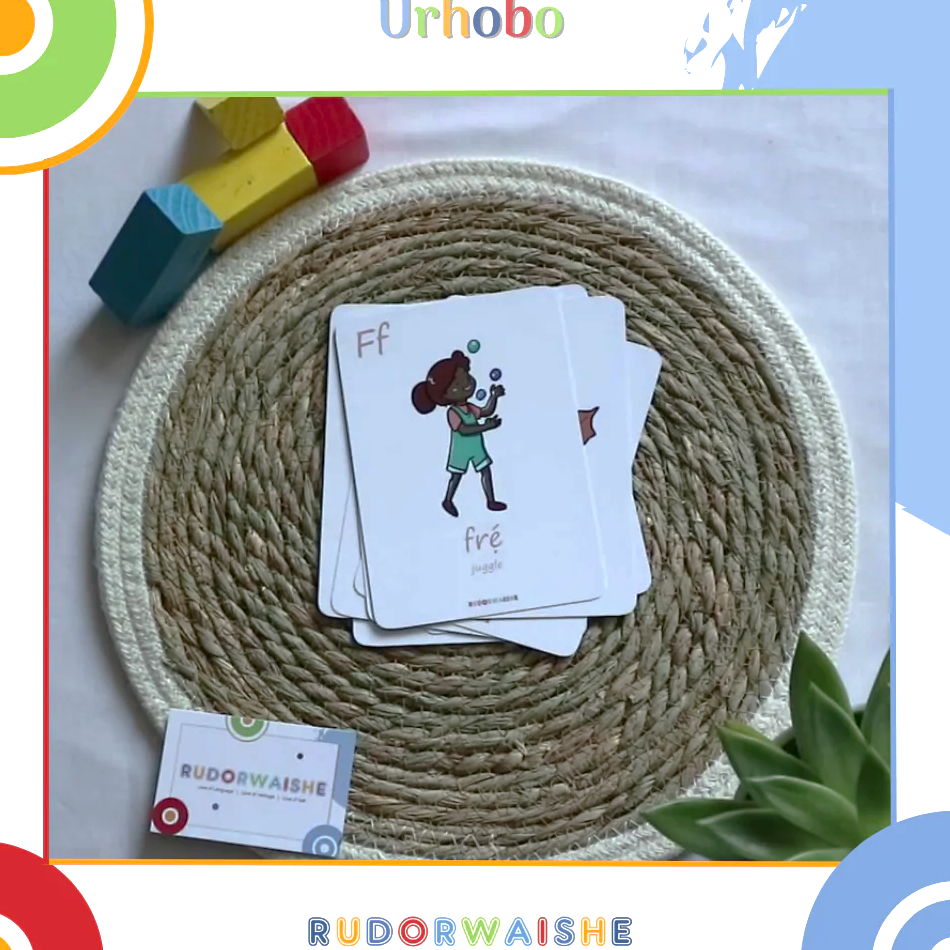 image of a flashcard that has a girl juggling with the Urhobo translation for the work